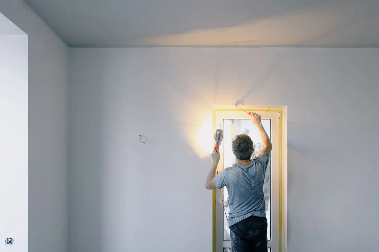 A contractor carrying out a repair at a managed property